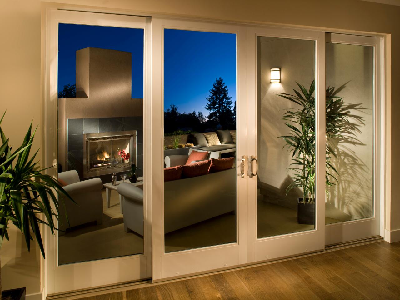 What materials are commonly used in modern sliding door designs?